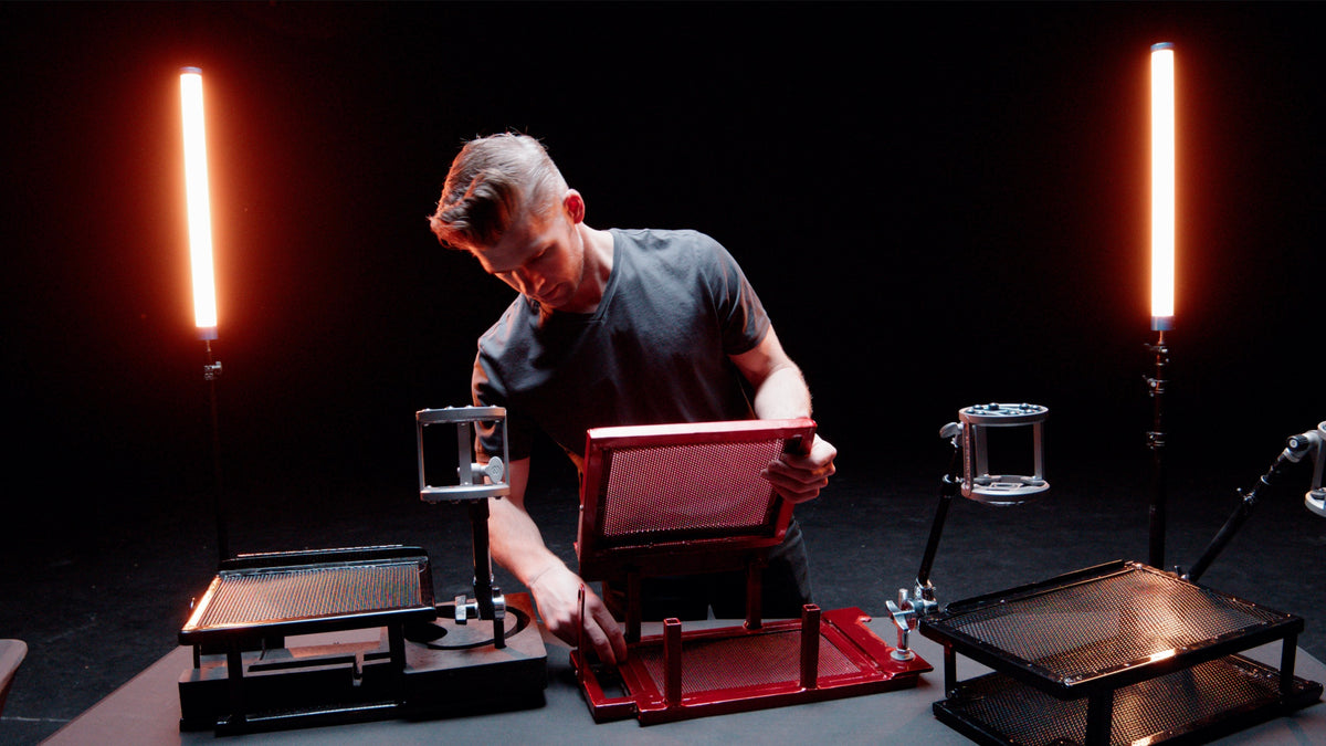 John developing the Vox Boy tray, surrounded by red and black prototypes