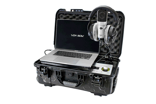 Vox Boy VB1 Pro portable studio kit open, with a laptop on the tray, SC-1 microphone on the boom arm and DT 770 PRO headphones