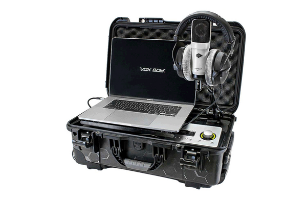 Vox Boy VB1 Pro portable studio kit open, with a laptop on the tray, SC-1 microphone on the boom arm and DT 770 PRO headphones